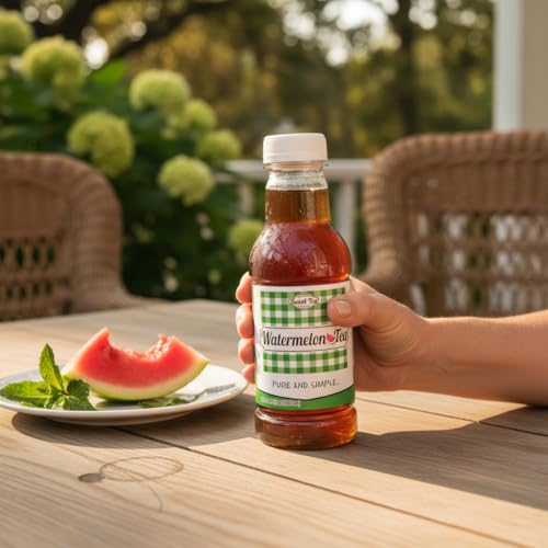 Southern Sweet Tea Co. Watermelon Iced Tea 16oz bottle held outdoors with a fresh watermelon slice and mint garnish.