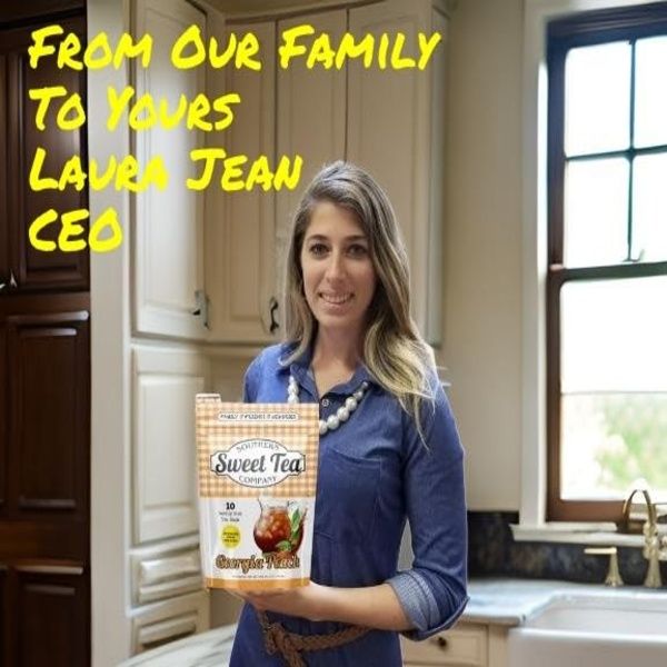CEO Laura Jean holds Georgia Peach Iced Tea bags in a modern kitchen. Southern Sweet Tea Company lifestyle image.
